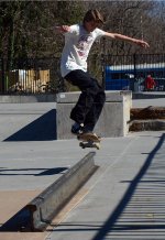 All three trains are gone, but here is an interesting use of a piece of rail...  skateboarding challenge